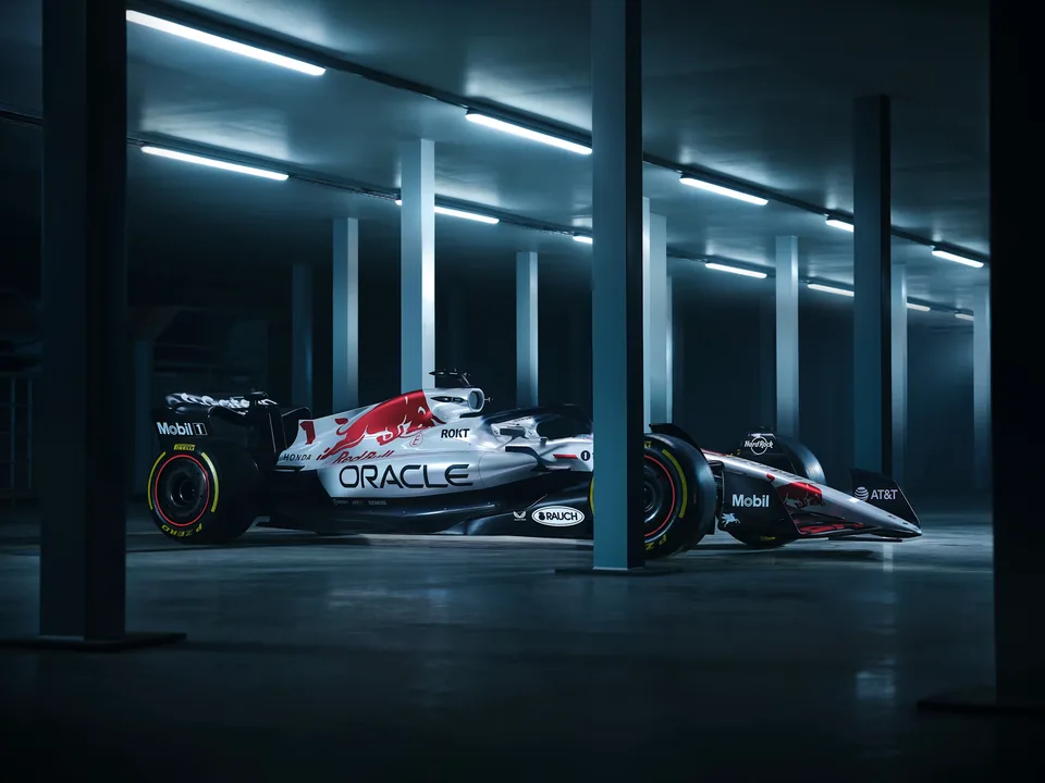 The same car in profile under studio strip lighting.